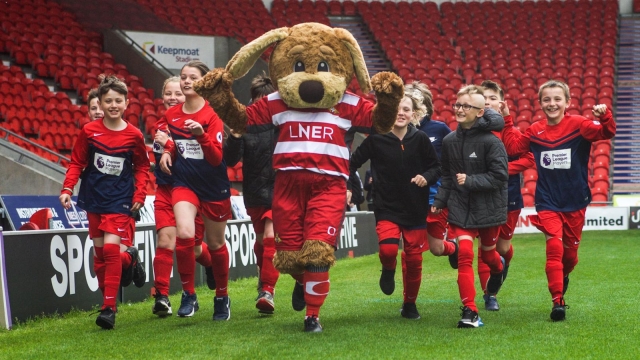 Doncaster children complete laps of Keepmoat Stadium pitch for ‘Mile for Mind’ during Mental Health Awareness Week 