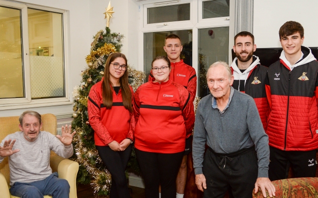 Student council club together to provide gifts to care home in Doncaster, with help from special guests