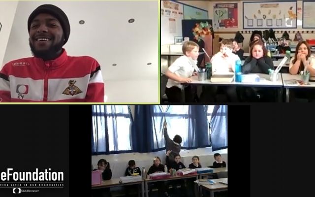 Rovers defender Cameron John surprises students at Doncaster primary school with virtual player appearance