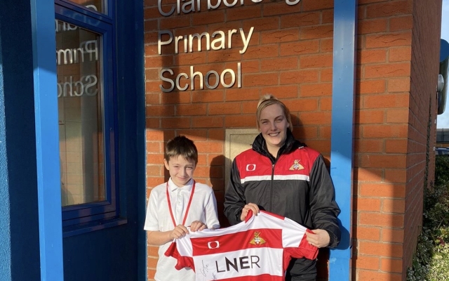 Literacy event winner receives signed Doncaster Rovers’ shirt