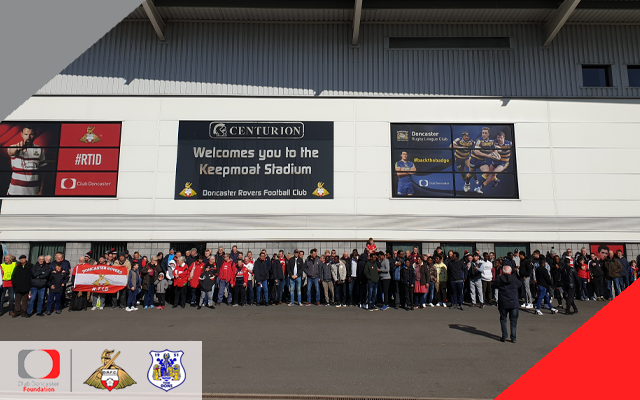 Refugees and Fit Rovers join together to walk to the stadium